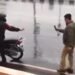 तेज बारिश से बचने के लिए सड़क किनारे रुकना भी अपराध! पुलिस ने किए चालान